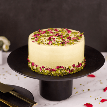 Italian Pistachio Cake with Roasted Plum Frosting - A Cozy Kitchen